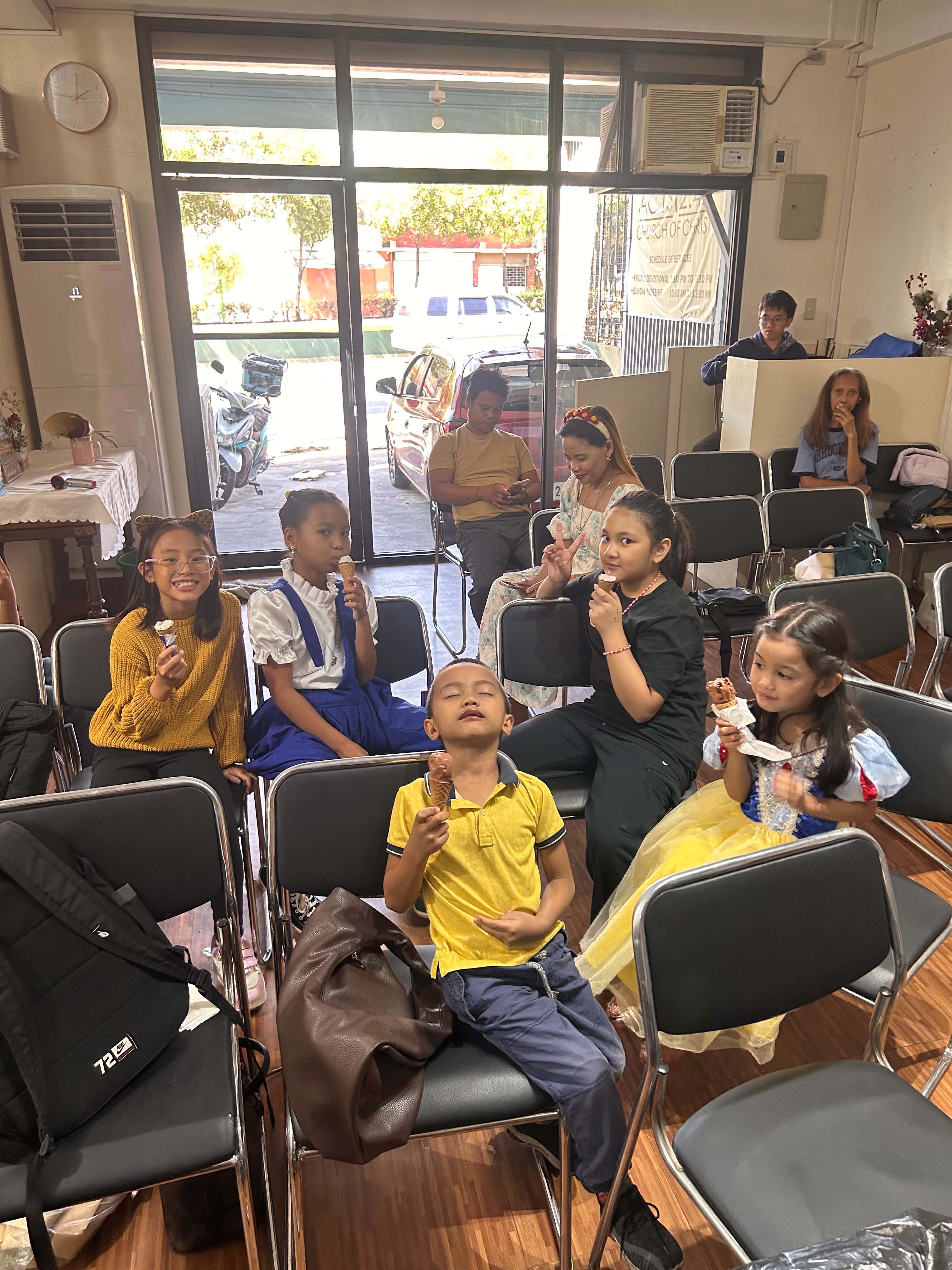 Kids enjoying ice cream during the activity
